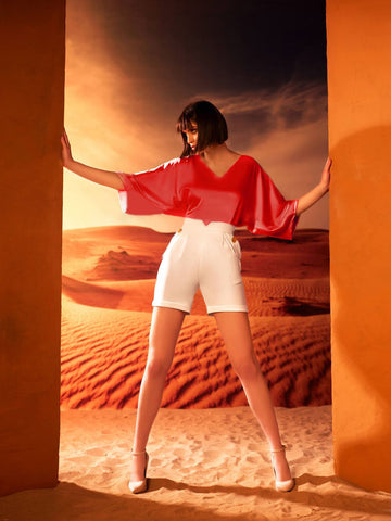 V-neck blouse in satin fabric with High-waisted short pockets V-neck blouse in satin fabric with High-waisted short pockets