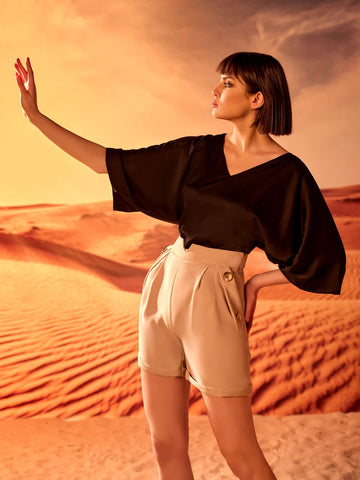V-neck blouse in satin fabric with High-waisted short pockets V-neck blouse in satin fabric with High-waisted short pockets