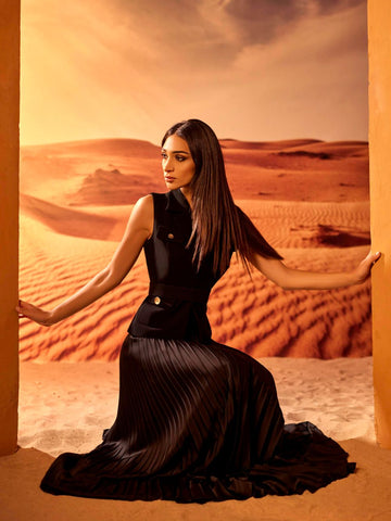 Sleeveless blazer and Pleated long skirt Sleeveless blazer and Pleated long skirt