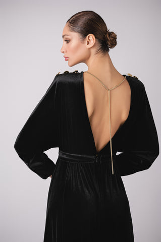 Deep plunge velour maxi dress with signature Cherine Fakhry belt and gold button details Deep plunge velour maxi dress with signature Cherine Fakhry belt and gold button details