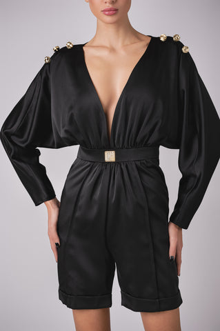 Deep plunge satin jumpsuit with gold button shoulder details