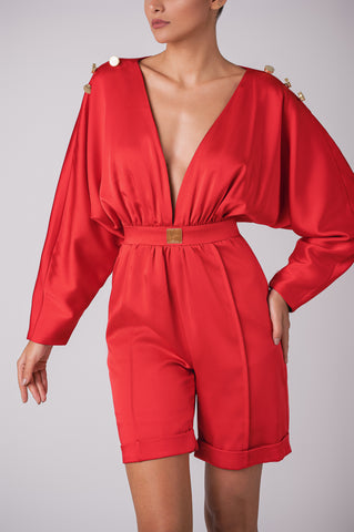 Deep plunge satin jumpsuit with gold button shoulder details